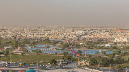 Bridge with fountain and lake in the Aspire park timelapse in Doha, Qatar