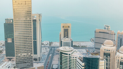 Skyscrapers before sunset timelapse in the skyline of commercial center of Doha, the capital Qatar