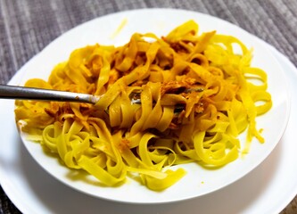 Authentic fettuccine or tagliatelle with tomato sauce and grated parmesan. real food