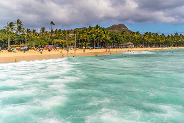 View of Waikiki Beach with people relaxing, Honolulu, Hawaii