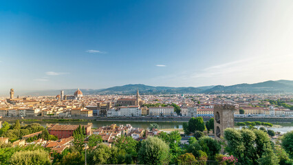 Top view of Florence city timelapse at sunrise with arno river bridges and historical buildings