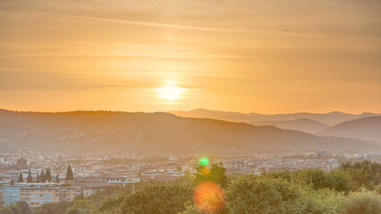 Sunrise top view of Florence city timelapse with arno river bridges and historical buildings