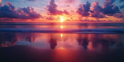 Obraz premium Sunset reflection over tranquil ocean waves beachside scenic landscape serene atmosphere