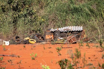 Rustic background with brass drums pierced by gunshots