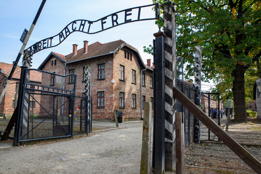Camp entrance, Auschwitz I - former German Nazi Concentration and Extermination Camp - Poland. Nazi slogan "Arbeit Macht Frei" - "Work makes one free"