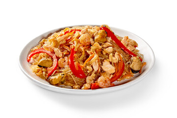 Cellophane noodles with shrimps, mussels and salmon lying on white plate