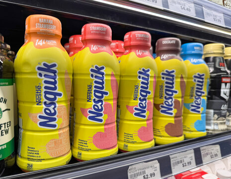 Nesquik drinks on sale at a grocery store.