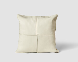 White leather cushion resting on white background