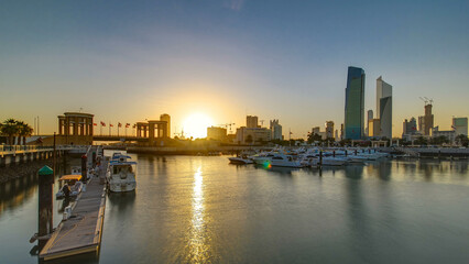 Fototapeta premium Sunrise. Yachts and boats at the Sharq Marina timelapse in Kuwait. Kuwait City, Middle East