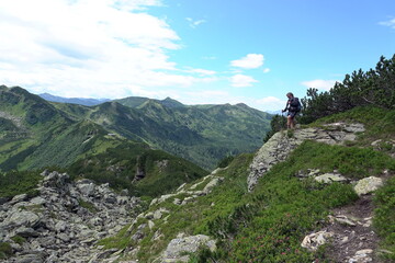 Fototapeta premium Wanderer zwischen Plannereck und Rotbuehel