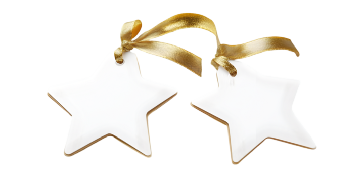Two white star shaped ornaments with gold trim and ribbons against a black background space for text - Powered by Adobe