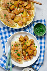 Chicken breast and potatoes in a creamy sauce.top veiw