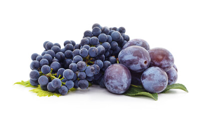 Group of ripe plums with grapes.