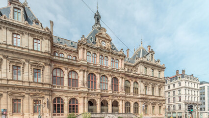 Fototapeta premium Hyperlapse of Palais de la Bourse or Palais du Commerce front view in the Les Cordeliers quarter, Lyon, France.