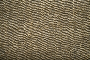 Close-up of woven burlap texture in earthy tones.