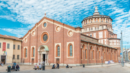 Santa Maria delle Grazie timelapse with blue cloudy sky.