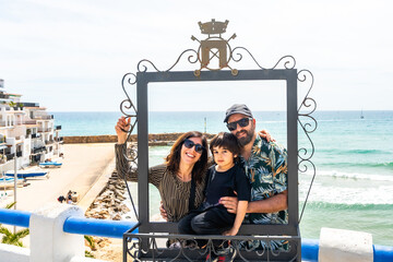 Family enjoying the view of roc de sant gaieta in comarruga, tarragona