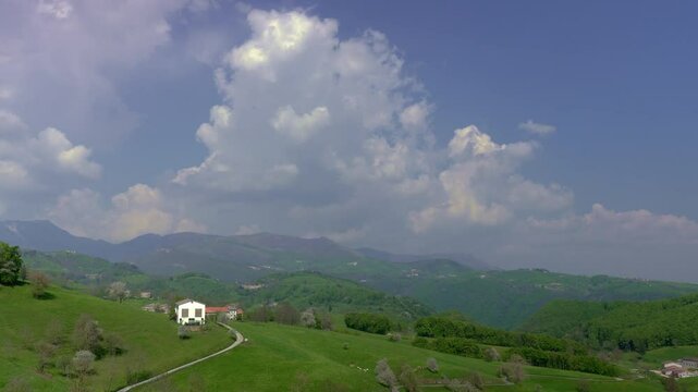 Timelapse of Fast Moving Cloud Formations Over Mountain Peaks