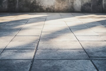 Fototapeta premium Minimalist Skateboard on Gray Cement Background with Urban Shadows