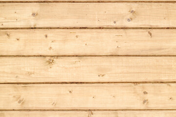 Fototapeta premium Wooden boards arranged in a natural pattern create a rustic and warm atmosphere for home decor