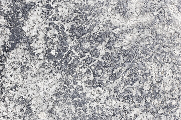 Granite texture closeup view. Rough stone surface background. Natural grey pattern. Hard rock structure. Raw mineral slab. Durable material. Abstract granite detail. Solid granite. Building decor.