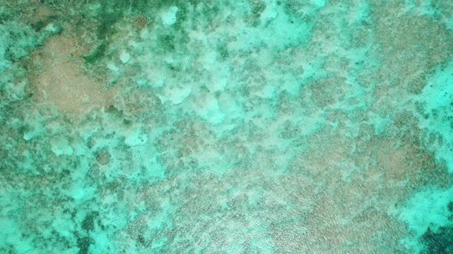 4K Aerial Drone Footage of Guyam Island in Siargao, Philippines &ndash; Tropical Sandbar, Clear Blue Water, and Palm Trees