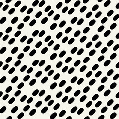 Vector seamless grainy pattern. Abstract background with freeform camouflage diagonal spots. Tiny rough organic ovals. Monochrome spotty texture.