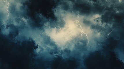 Obraz premium Dramatic storm clouds illuminated by flashes of lightning.