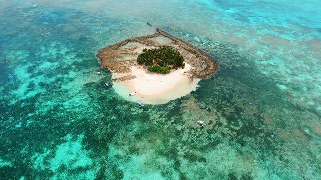 4K Aerial Drone Footage of Guyam Island in Siargao, Philippines &ndash; Tropical Sandbar, Clear Blue Water, and Palm Trees