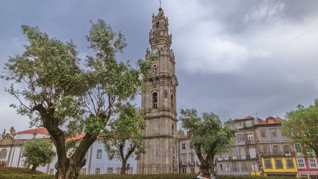 Bell tower of the Clerigos Church in cloudy blue sky background timelapse hyperlapse