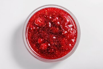 Delicious fruit spread in bowl on white backdrop Overhead perspective