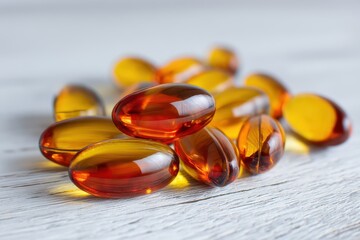 Fish oil pills on a white table