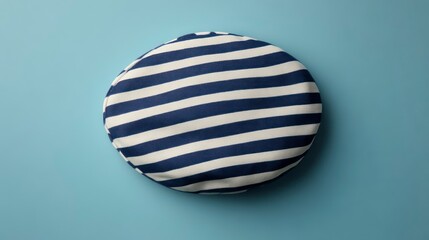 Obraz premium Round Striped Cushion on Solid Background Navy Blue and White Horizontal Stripes for Home Deco