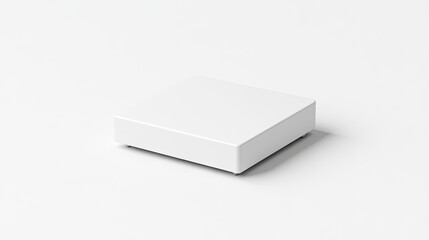 Naklejka premium Blank white gift box on a plain surface.