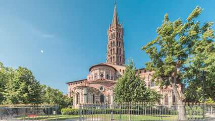 The cobbled parvis of the Basilica of Saint Sernin in Toulouse, France, timelapse hyperlapse.
