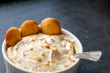Close-up of delicious banana pudding with wafers for dessert