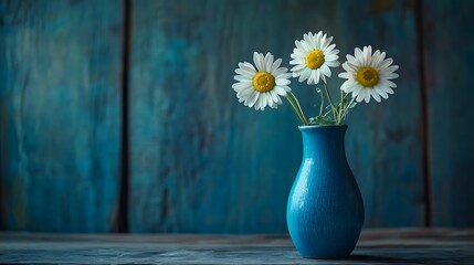 Three daisies in a blue vase placed gently on a rustic wooden table generative ai © Photo