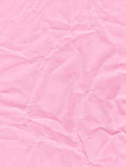 folded pink crumpled paper texture background