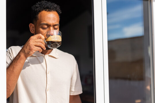 a man drinking coffee