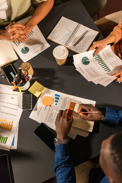 Businesspeople reviewing financial data