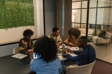 Group of colleagues in modern meting room
