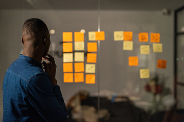 Man thinking on ideas and plans at office