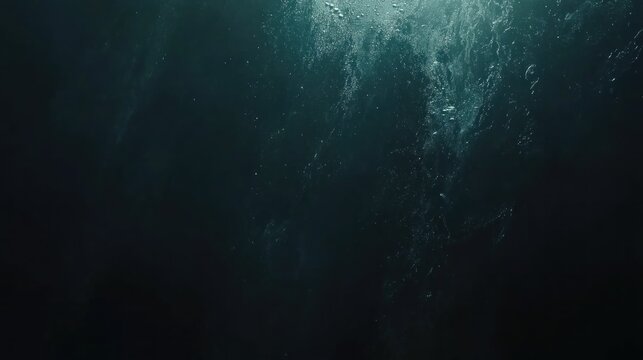 Underwater depths reveal ethereal bubbles rising.
