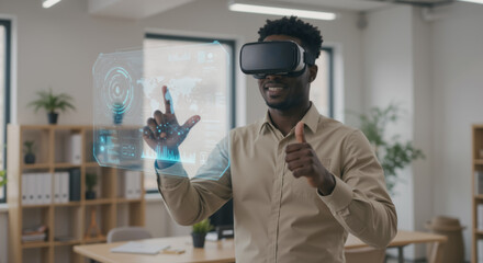Young African American professional man using VR headset in modern office. Black office worker man in green shirt gesturing with virtual reality interface. Augmented reality in business concept