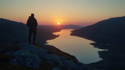 Obraz premium view of a man enjoying the afternoon on a mountain