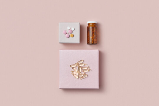 Top view of vitamin pills in box