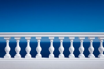White balustrade against the azure sea and clear sky creates a calming vista