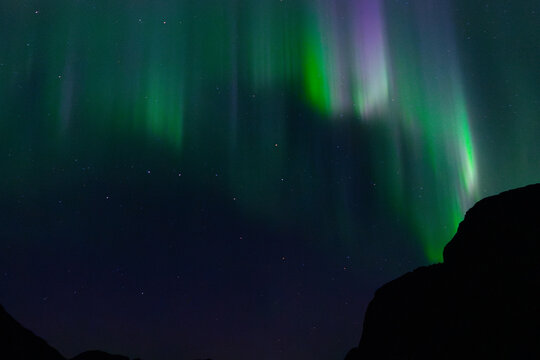 Vibrant Aurora Borealis in night sky 