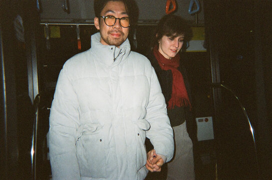 Couple in bus - Powered by Adobe