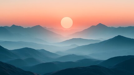 Sunrise over misty layered mountain range